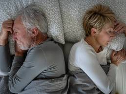Why Intimacy Becomes the Battleground in Long-Term Relationships 5 Married couple experiencing emotional distance in intimate space