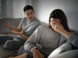 Couple showing different reactions in conflict representing escalation and withdrawal